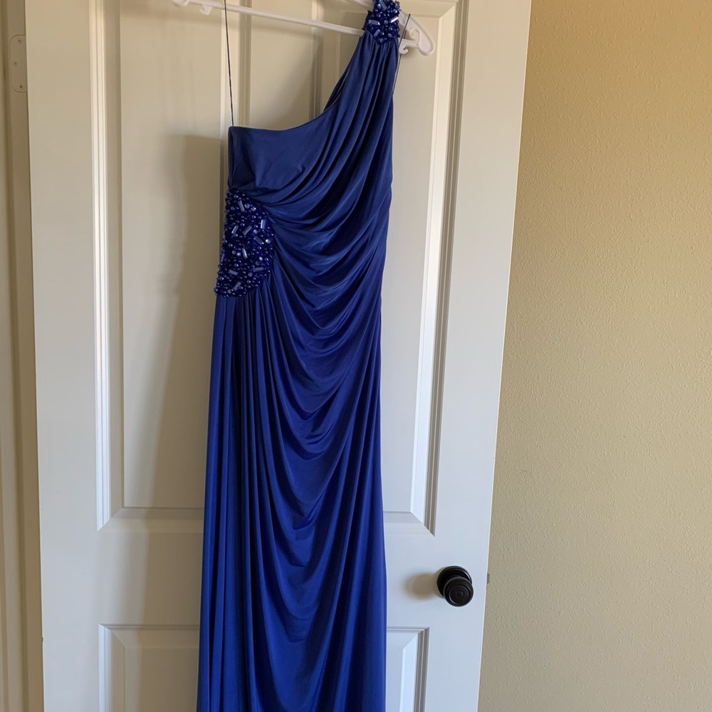 Purple long one shoulder draped evening gown